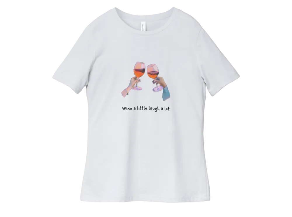 A white short-sleeve crewneck t-shirt featuring a graphic of two hands clinking wine glasses with the text 'Wine a little laugh a lot' printed below, displayed
