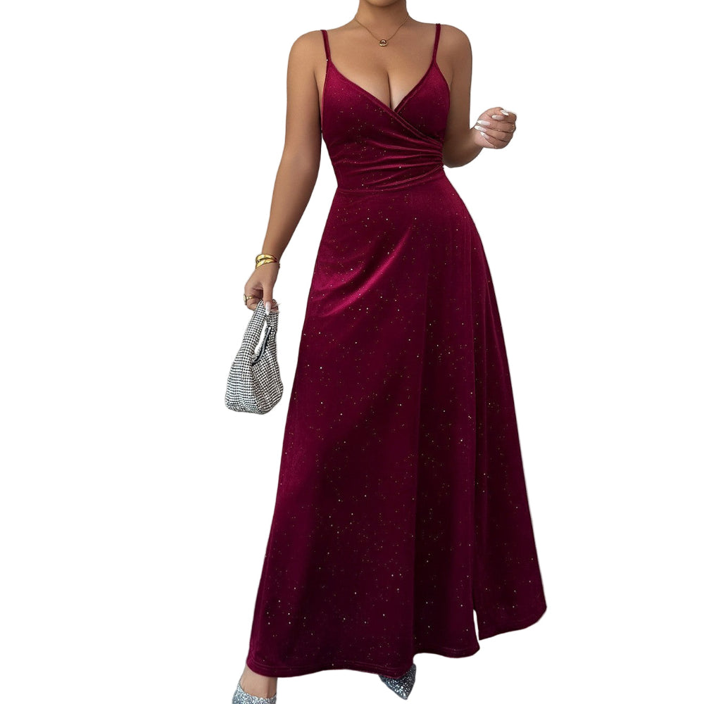 Woman wearing a burgundy evening gown with a plain background